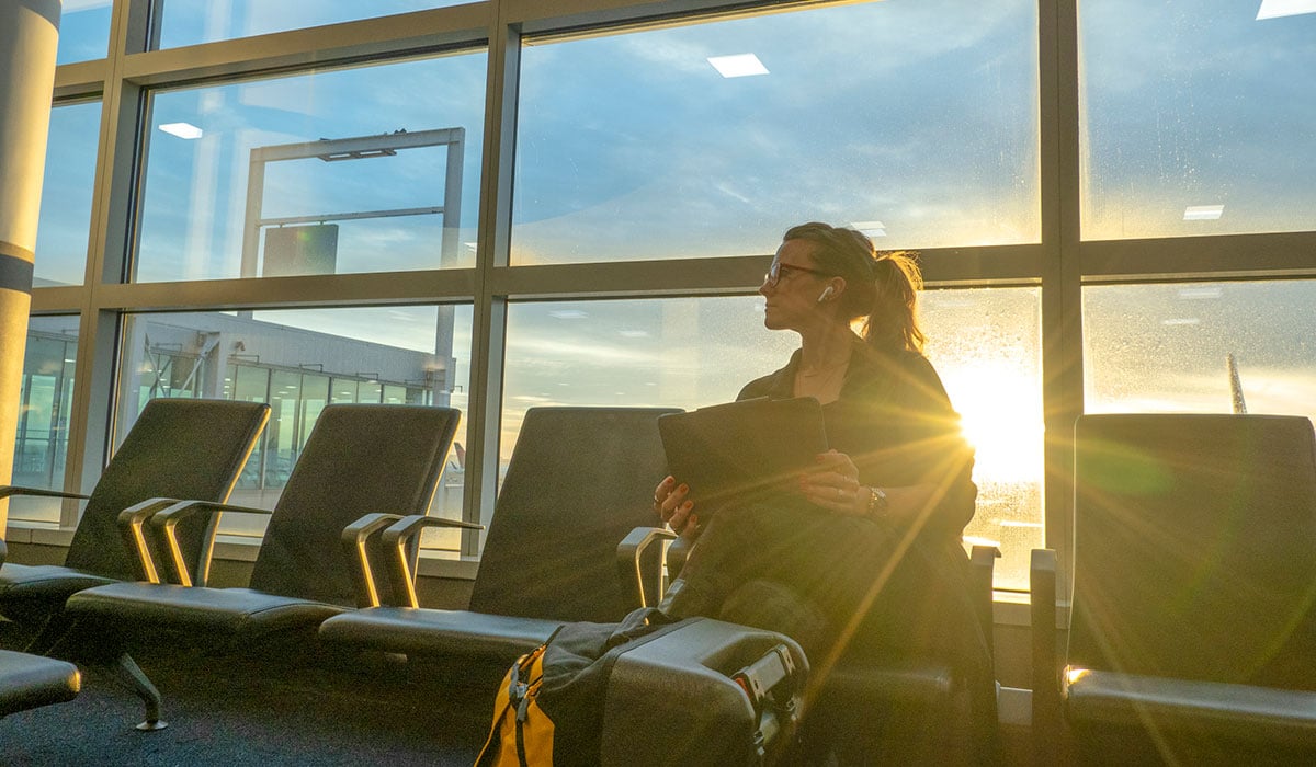 Person at airport with a laptop