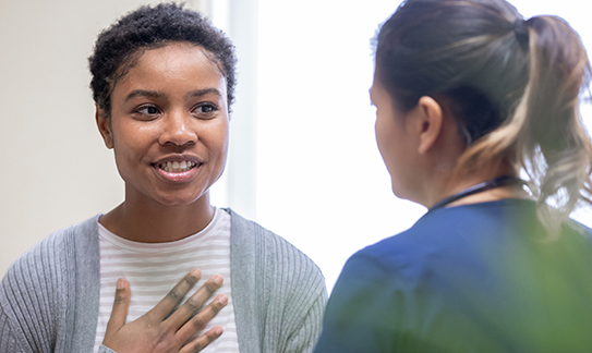 Patient speaking to a nurse