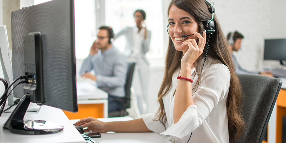 Woman answering calls at a call centre