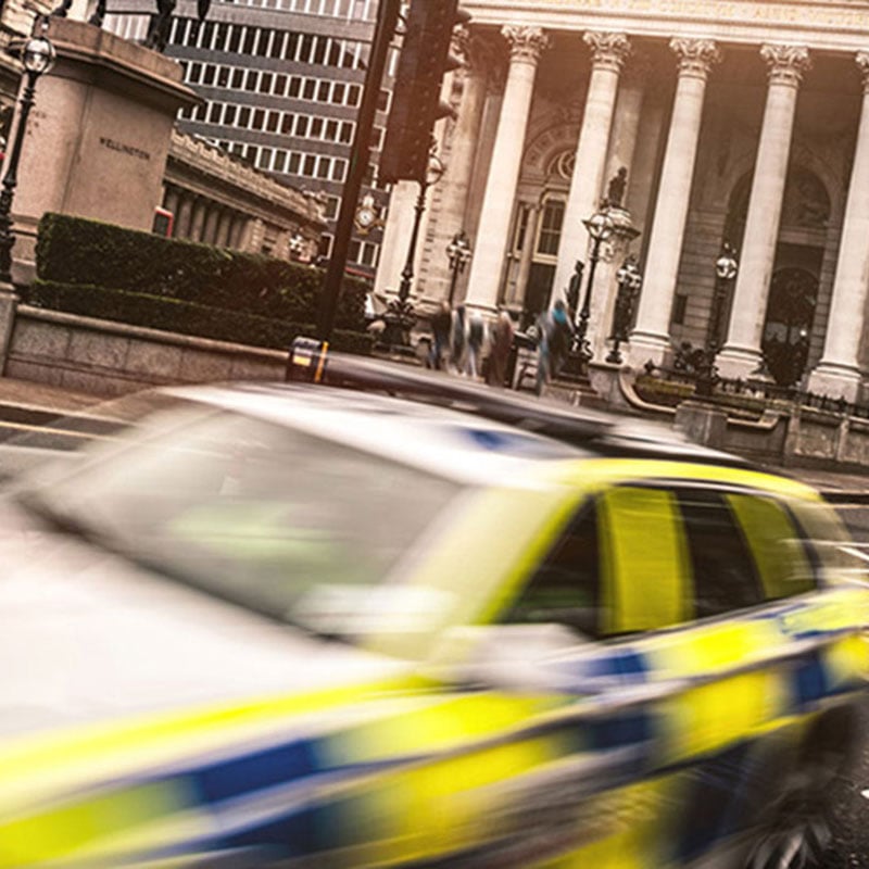 Police car speeding through London