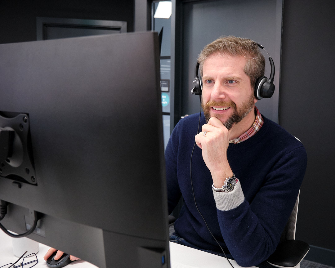 CDS colleague in the office on a Teams call CDS colleague in the office on a Teams call