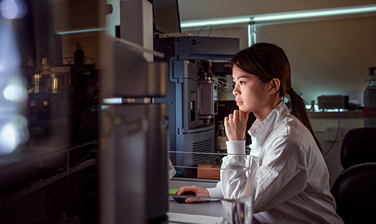 Scientist working at a computer