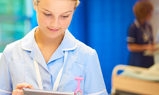 Nurse holding an iPad