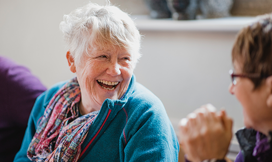 Two women laughing